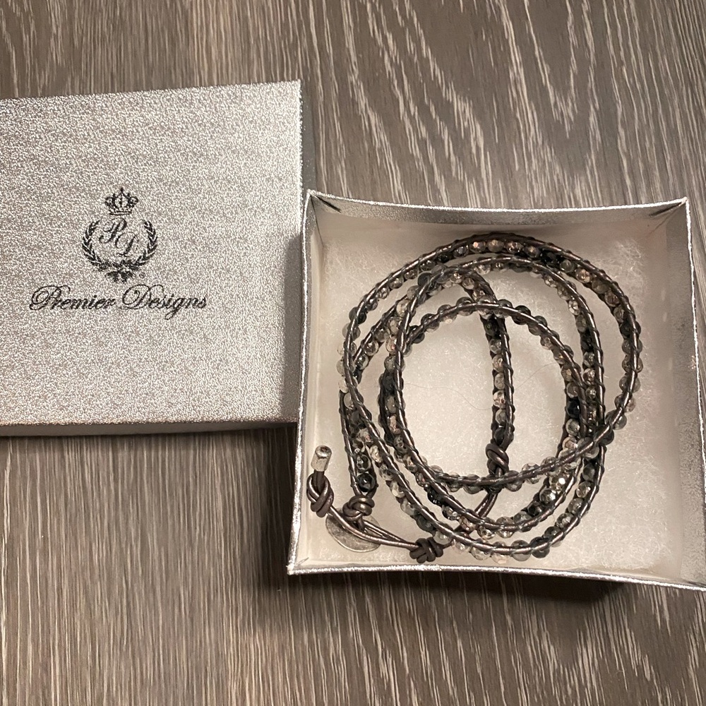 Premier jewelry leather and bead wrap bracelet. Wraps wrist approx 3 times.